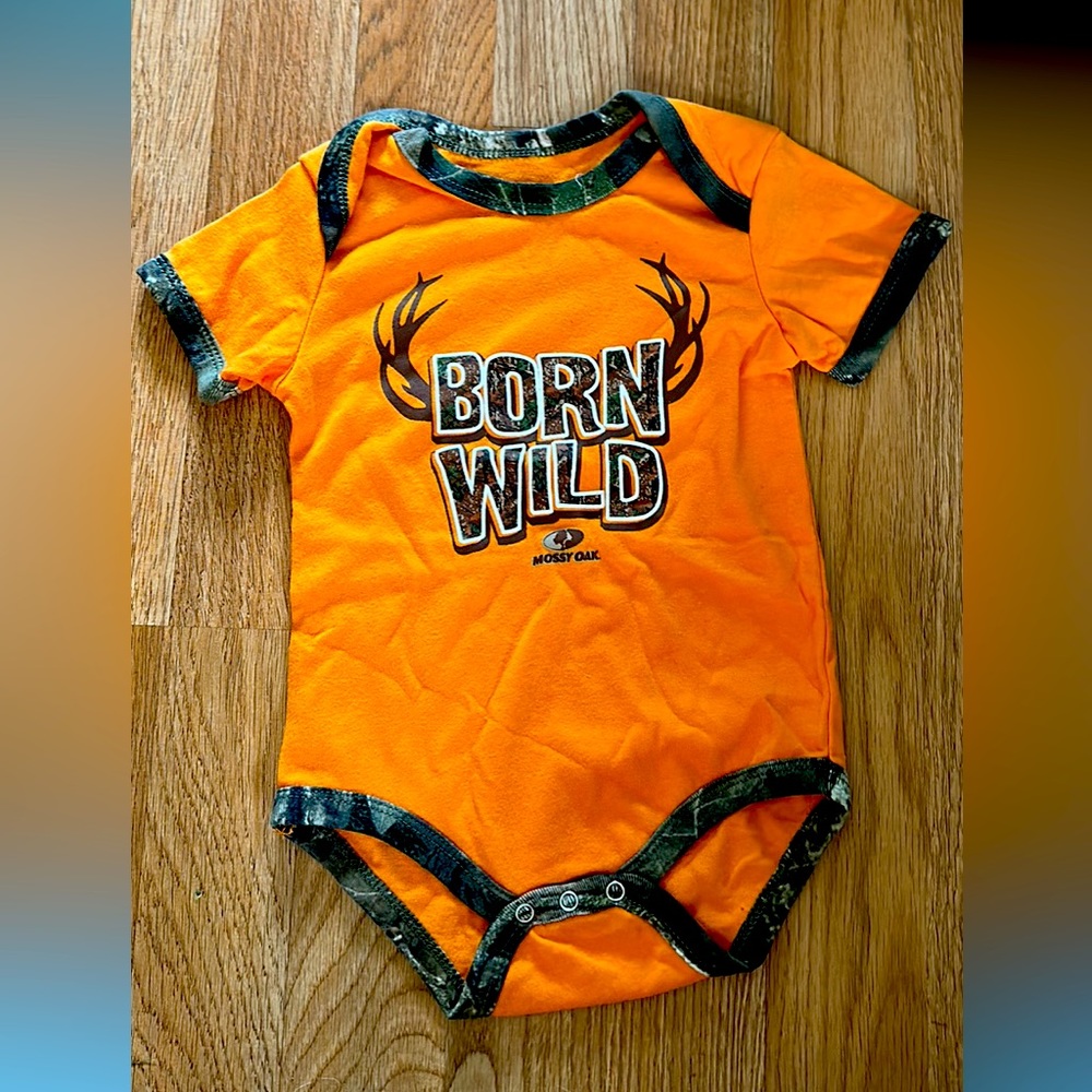 3-6M Mossy Oak Born Wild orange and camo
onesie